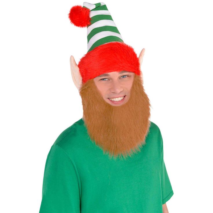 "Buy the Christmas Elf Hat with Beard Set at Michaels. com. This silly Christmas accessory combines a whimsical green and white striped Elf Hat hat attached adorable elf ears and with a fuzzy brown Santa beard. Make the season silly with our Elf Hat with Beard set. Skip gross and painful glues or itchy, uncomfortable wigs and instead get the elfin look by wearing just one comfortable hat! This silly Christmas accessory combines a whimsical green and white striped Elf Hat hat attached adorable el Silly Christmas, Christmas Elf Hat, Santa Beard, Elf Ears, Elf Hat, Christmas Accessories, Christmas Elf, Adult Costumes, Green And White