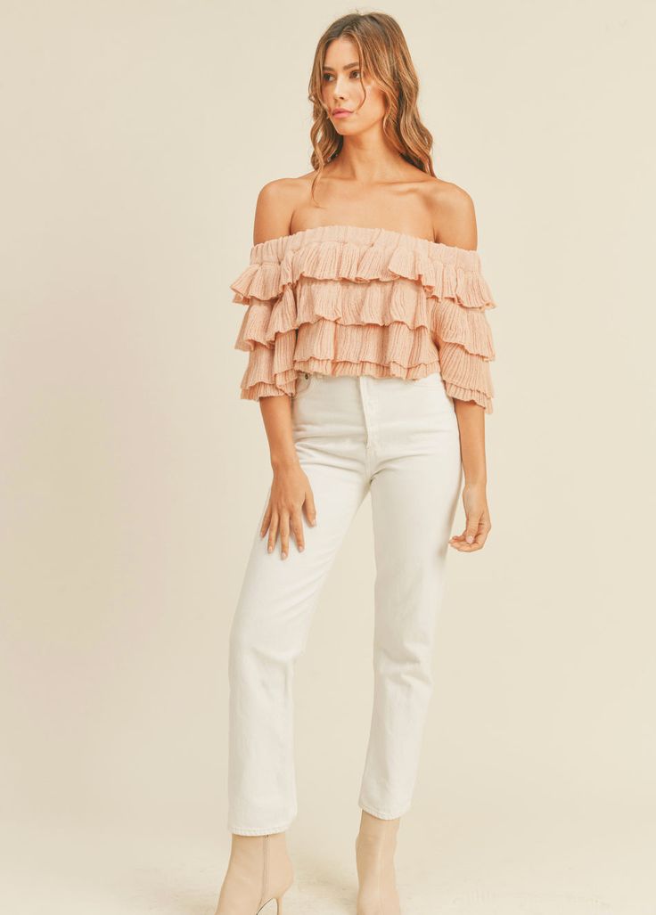 Layered, flirty and ruffled! This adorable lightweight knit top is just the right amount of dressy for that brunch mimosa or dinner and drinks! Easy to pair with white denim or just some cut offs for a casual day out Available in Small, Medium and Large Runs true to size, length to waist 100% Cotton Chic Summer Blouse With Ruffle Hem, Casual Spring Party Blouse, Flirty Top For Brunch, Flirty Fitted Top For Brunch, Trendy Spring Blouse With Ruffles, Trendy Off-shoulder Blouse With Ruffles, Trendy Off-shoulder Ruffled Blouse, Spring Day Out Blouse With Ruffle Sleeves, Chic Flowy Blouse For Brunch