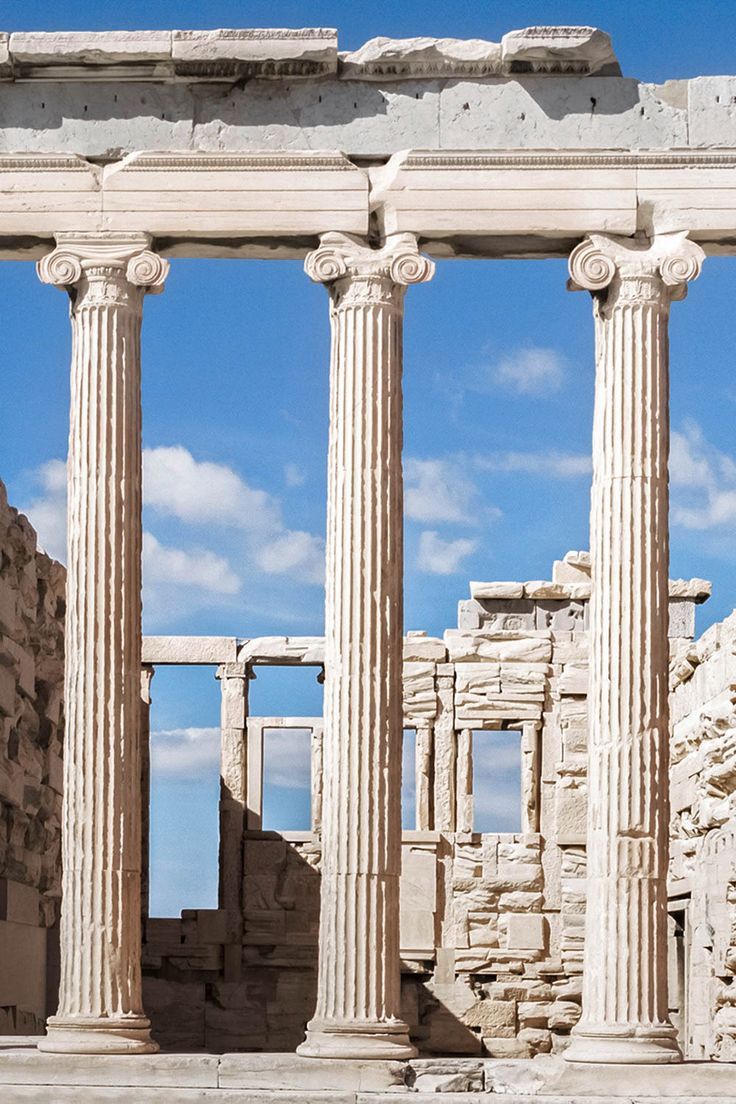 the ruins of an ancient building with columns