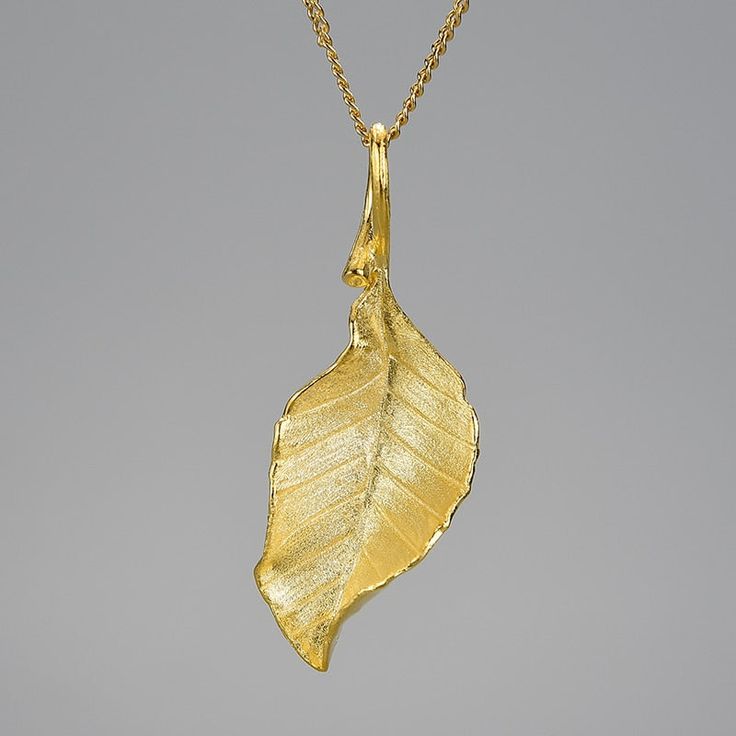 Embrace the timeless beauty of tree leaves and the luxurious allure of sterling silver and 18K gold with our Tree Leaf Jewelry Set—a truly captivating collection that adds sophistication and a touch of nature-inspired elegance to your style. Let this set be a reflection of your own connection to the natural world and a constant reminder to embrace your inner strength and beauty. Shape\pattern: Tree Leaf Model Number: LFJS0064 Metals Type: Silver Metal Stamp: 925,Sterling Jewelry Sets Type: Neckl Artistic Necklace, Handmade Pendant Necklace, Gold Jewelry Sets, Autumn Leaf, Leaf Jewelry, 18k Gold Jewelry, Gold Necklace Women, Leaf Necklace, Leaf Pendant