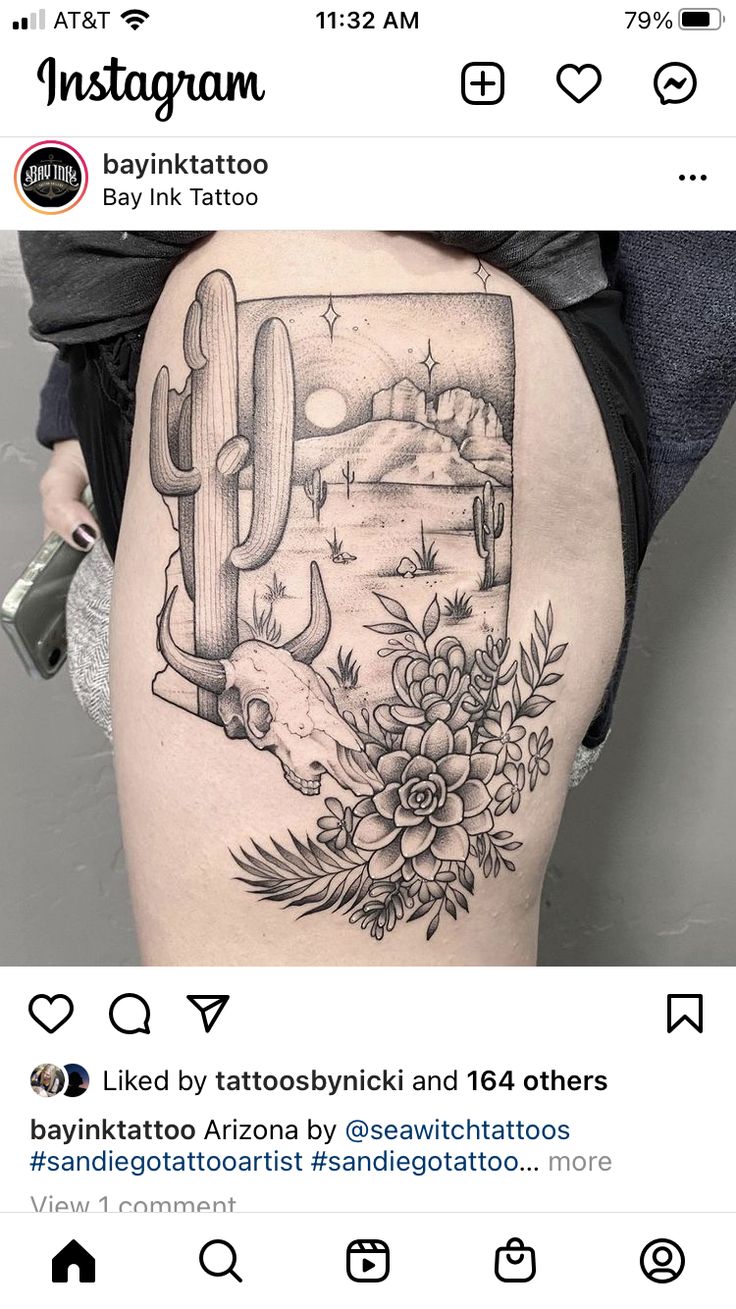 the back of a woman's thigh with an image of a cactus and flowers on it