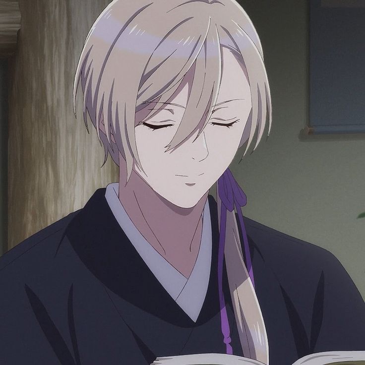 an anime character is reading a book and looking down at his face with eyes closed