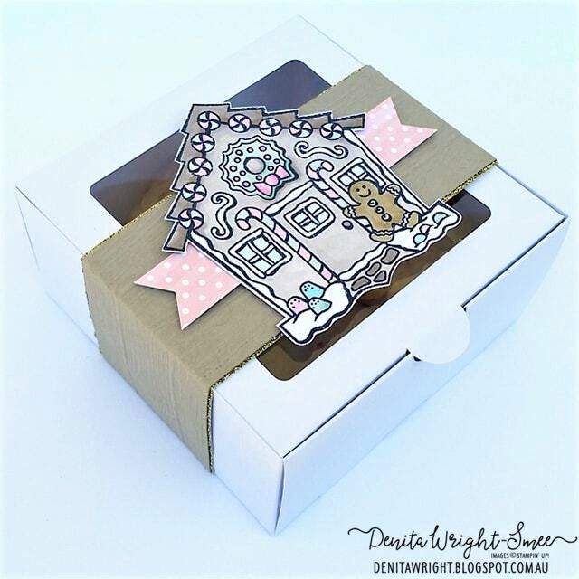 an open box that has some type of paper on it and is decorated with designs