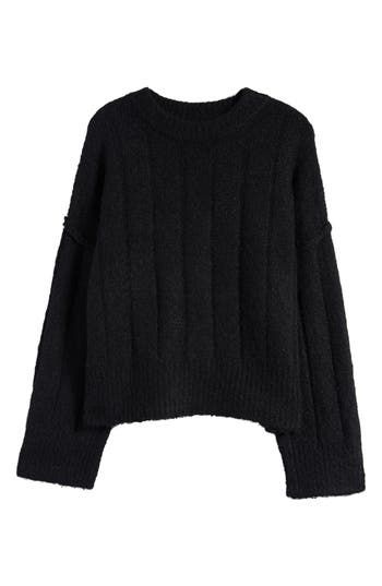 Cozy up in this oversized sweater made with wide-ribbed texture and raised seams that highlight the dropped shoulders. 23 1/2" length (size Medium) Crewneck Long sleeves Dropped shoulders Ribbed cuffs and hem 77% polyester, 23% nylon Machine wash, line dry Imported Oversized Cropped Sweater, Oversized Black Sweater, Rib Sweater, Ribbed Texture, Black Sweater, Sweater Making, Fabric Gifts, Nordstrom Store, Free Fabric