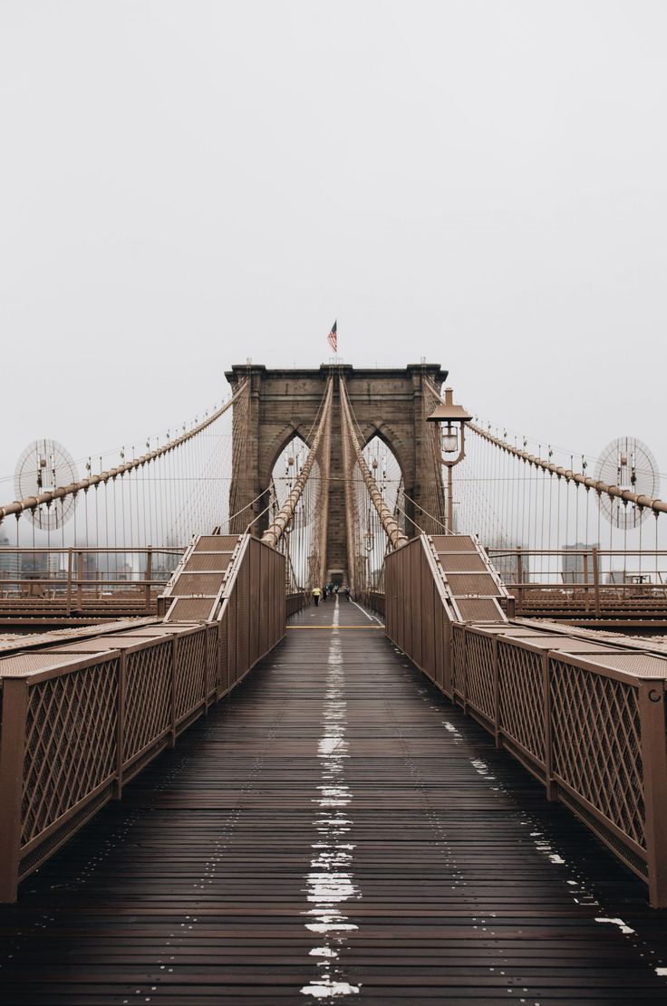 the bridge is very long and has many railings