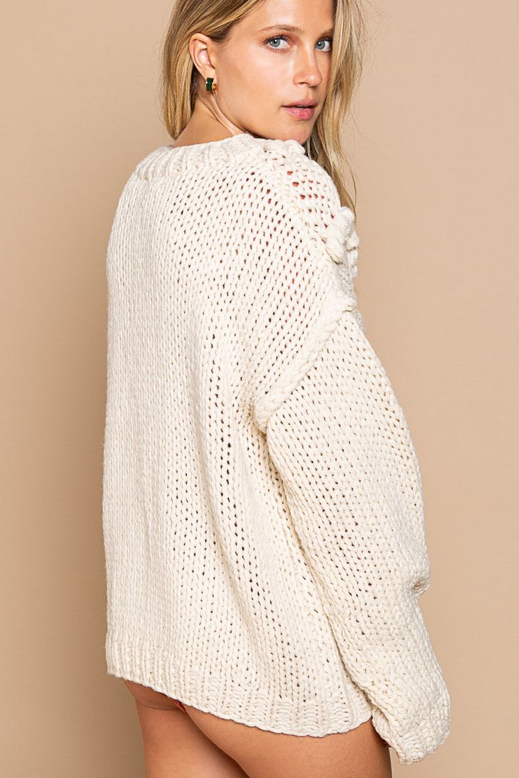 -Color: Cream -Pom pom accents -Oversized fit with long sleeves -Round neckline -Outseaming detailing -Length :23" -Bust: 24" -Content: 100% Acrylic -Imported -Mode is wearing size Small Textured Knit Long Sleeve Top, Winter White Long Sleeve Relaxed Fit Sweater, White Balloon Sleeve Sweater For Fall, Winter White Long Sleeve Sweater, White Textured Knit Long Sleeve Outerwear, Oversized Chunky Knit Long Sleeve Top, Chunky Knit Long Sleeve Outerwear, Oversized Long Sleeve Top In Winter White, Winter White Oversized Long Sleeve Top