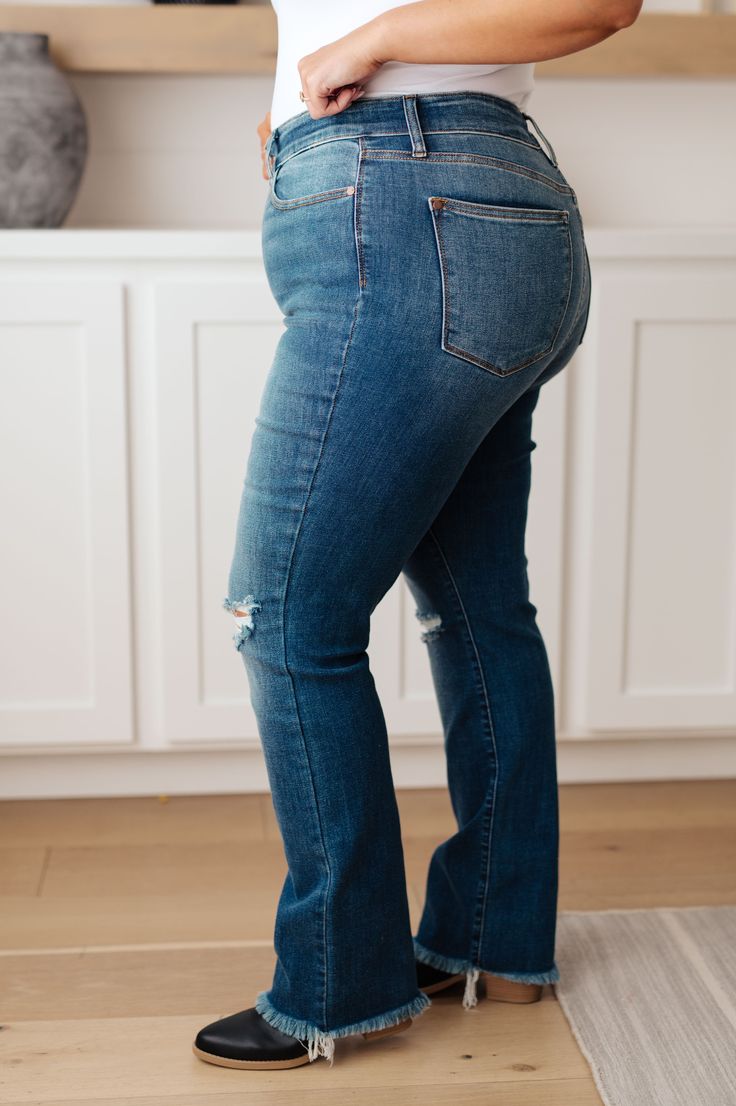 Dare to rock our Morgan High Rise Distressed Straight Jeans from Judy Blue! This exquisite denim design features a daring high rise, distressed knees, raw hemline, and medium wash for an iconic look. Ready for any risk-taker! Judy Blue High Rise Zip Fly Medium Wash Distressed Raw Hem Straight Leg 9% Rayon, 5% Elastrel-Poly, 1 % Spandex True to Judy Blue Sizing 0/24: Waist 25" Hips 32" Rise 9.5" Inseam 32"1/25: Waist 26" Hips 33" Rise 9.5" Inseam 32"3/26: Waist 27" Hips 34" Rise 10" Inseam 32"5/2 Judy Blue Jeans, Denim Design, Plus Size Swimwear, Outerwear Coats, Sweater Blouse, Jeans For Sale, Cocktail Dress Party, Classic Looks, Straight Jeans