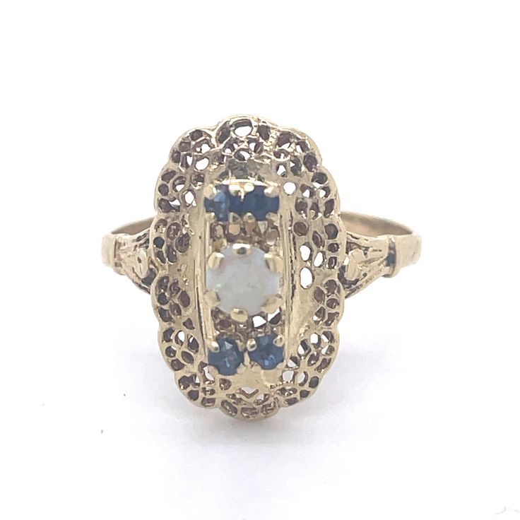 Antique Opal Ring, Vintage Sapphire ring, 14k Yellow Gold, Vintage Ring, Antique jewelry, Estate jewelry, vintage opal jewelry, jewelry gift Jewelry Yellow Gold 14k  (the gold has been tested by a professional) Total Carat Weight:0.28ct (Approx.) Total Metal Weight: 2.4g Size:6 US \ 16.51 mm (inner diameter) Vintage 14k Gold Filigree Ring With Gemstone, Vintage Multi-stone Opal Ring For Formal Occasions, Antique 14k Gold Moonstone Wedding Ring, Vintage Multi-stone Sapphire Ring In 14k Gold, Vintage 14k Stamped Opal Ring For Formal Occasions, Vintage Multi-stone Opal Ring Gift, Vintage Multi-stone Sapphire Ring, Vintage 14k Stamped Opal Ring Gift, Antique Multi-stone Opal Ring For Wedding