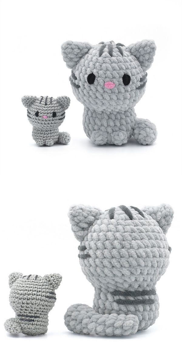 crocheted cat and kitten toy sitting next to each other on a white background