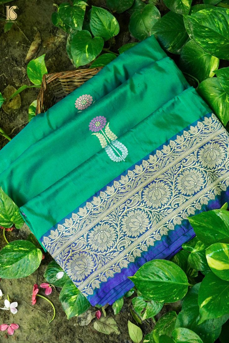 Indulge in the allure of Khinkhwab's Katan Silk Kadwa saree. This exquisite piece features the classic Katan silk weave with intricate Kadwa work, creating a luxurious texture and captivating design. Elevate your style with the timeless charm and craftsmanship embodied in this beautiful saree. Traditional Green Unstitched Suit, Green Pre-draped Saree With Motifs In Art Silk, Traditional Green Silk Shawl, Raw Silk Pre-draped Saree For Wedding With Traditional Patterns, Wedding Pre-draped Saree With Traditional Patterns In Raw Silk, Wedding Pre-draped Saree In Raw Silk With Traditional Patterns, Green Katan Silk Saree With Motifs, Green Katan Silk Traditional Wear With Motifs, Banarasi Silk Pashmina Shawl With Zari Work For Puja