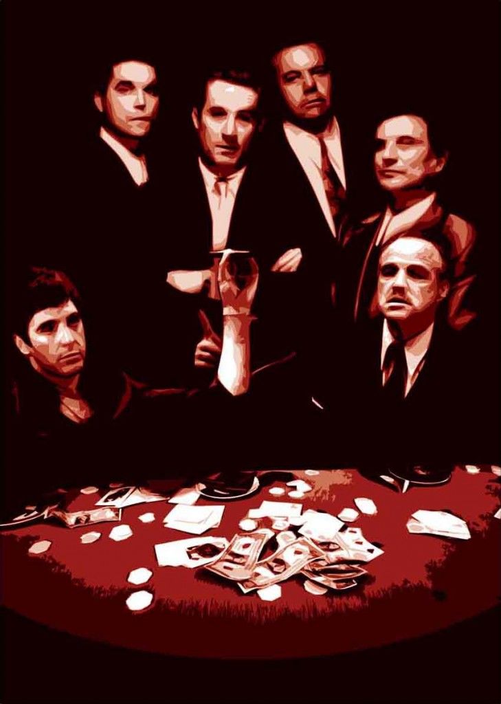 a group of men in suits sitting at a table with cards and money on it