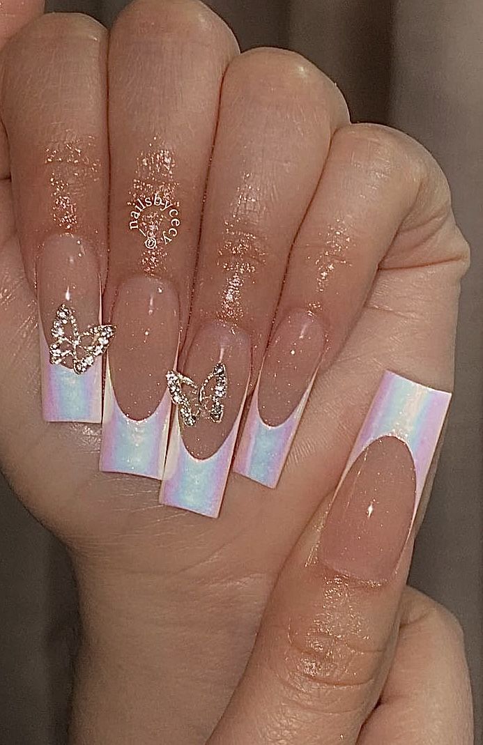 Chrome French Tip Nails With Charms, Chrome French Tip Nails With Gems, Trendy Nails With Charms, Iridescent White French Tip Nails, Birthday Nails Butterflies, Chrome White Nails French Tip, Nail Designs With Butterfly Charms, Butterfly Inspo Nails, Chrome Nails Pink French