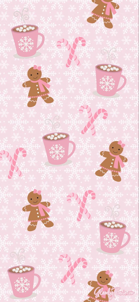 a teddy bear is sitting next to a cup of hot chocolate and candy canes