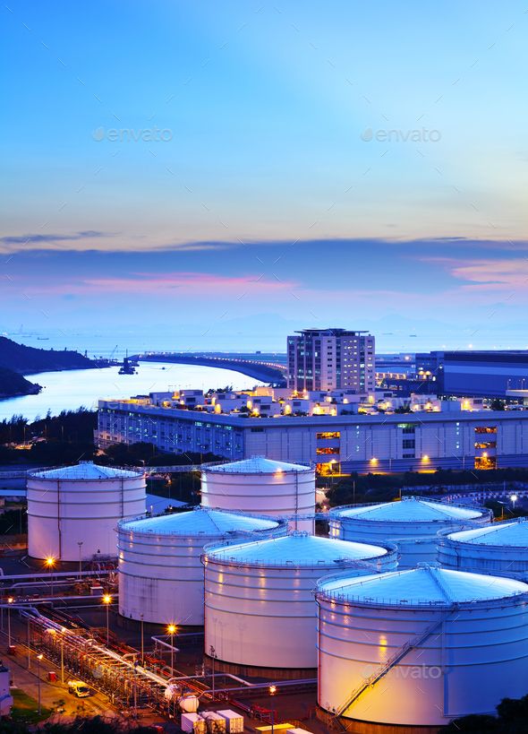 oil storage tanks at dusk in the city - stock photo - images and pictures from people's photoshop