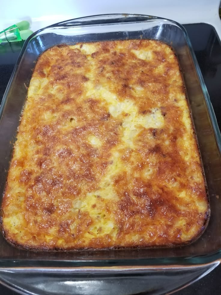 a casserole in a glass dish on top of a stove