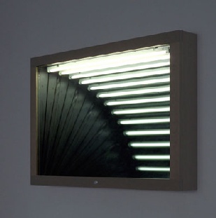 a wall mounted mirror with light coming through the blinds on it's side and reflecting in its reflection