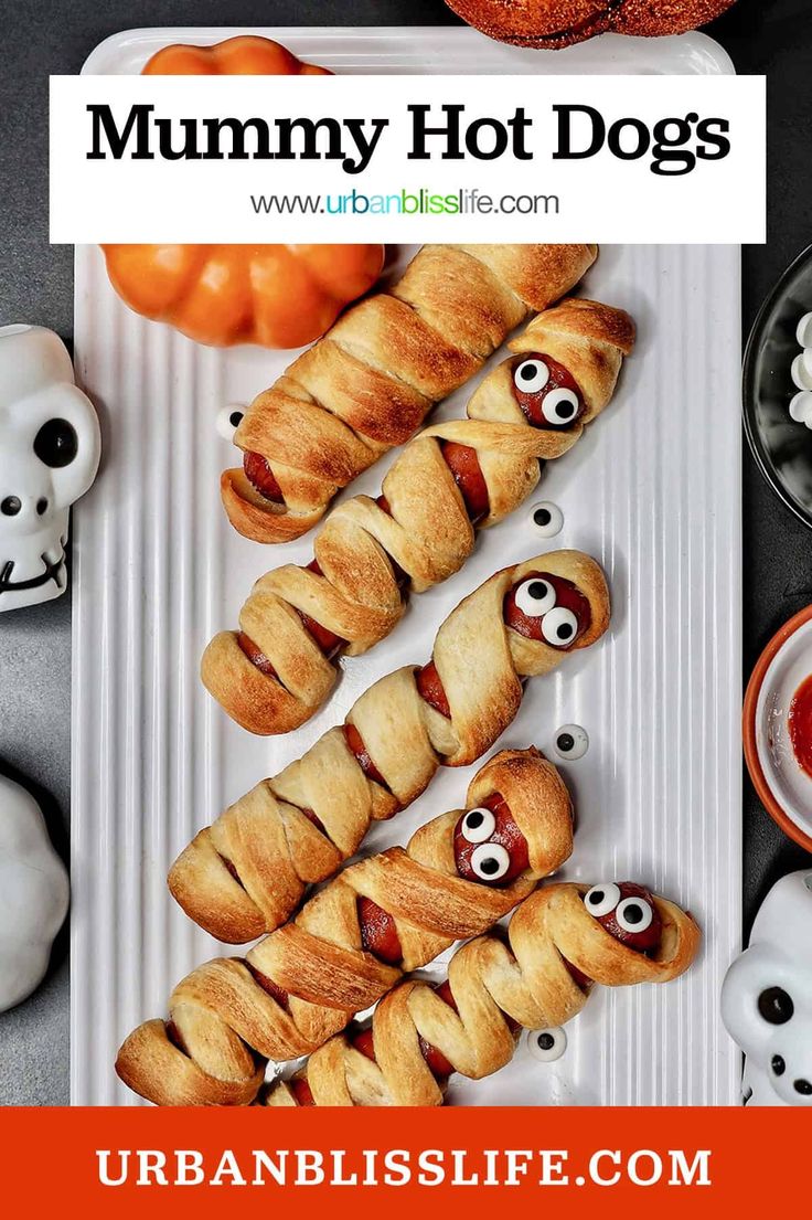 These Halloween Mummy Hot Dogs are cute, fun Halloween treats that are easy to make and perfect for any Halloween party! Get the easy Halloween recipe at UrbanBlissLife.com. Halloween Mummy Hot Dogs, Halloween Hotdogs, Mummy Hot Dogs, Bacon Wrapped Hotdogs, Wrapped Hot Dogs, Mummy Recipes, Mummy Dogs, Recetas Halloween, Halloween Party Appetizers