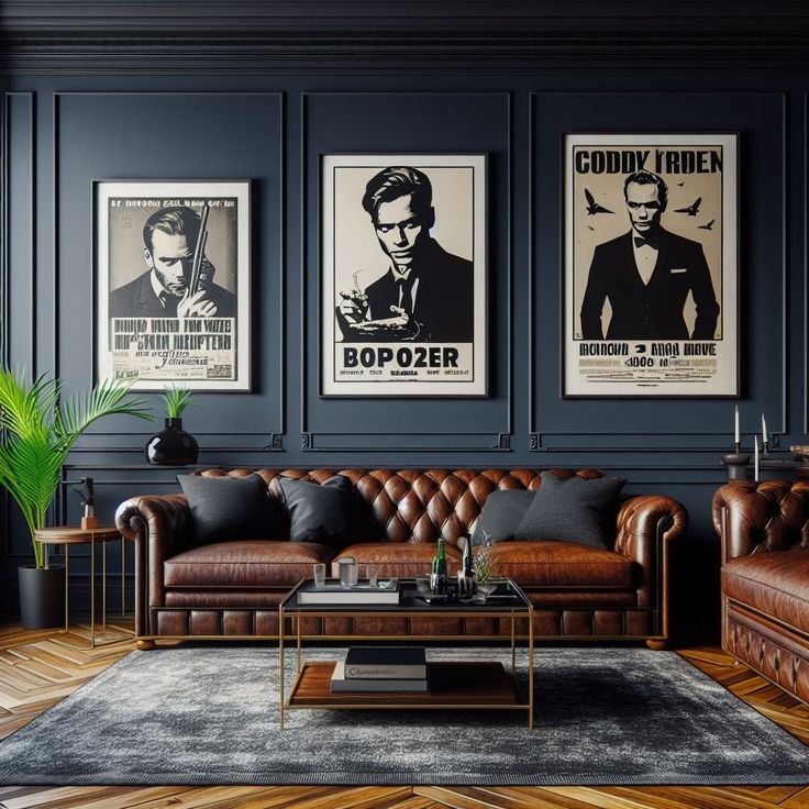 a living room with leather couches and posters on the wall above them, along with a coffee table