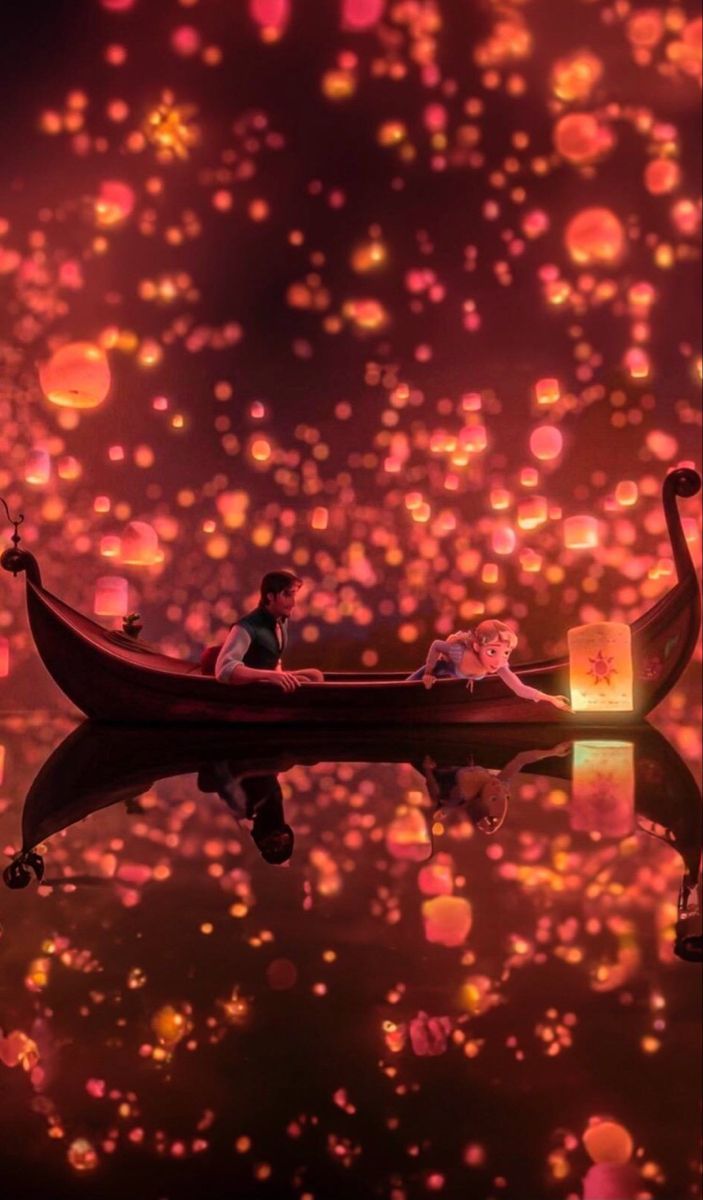 two people in a boat floating on top of water with lights behind them and the sky filled with bubbles