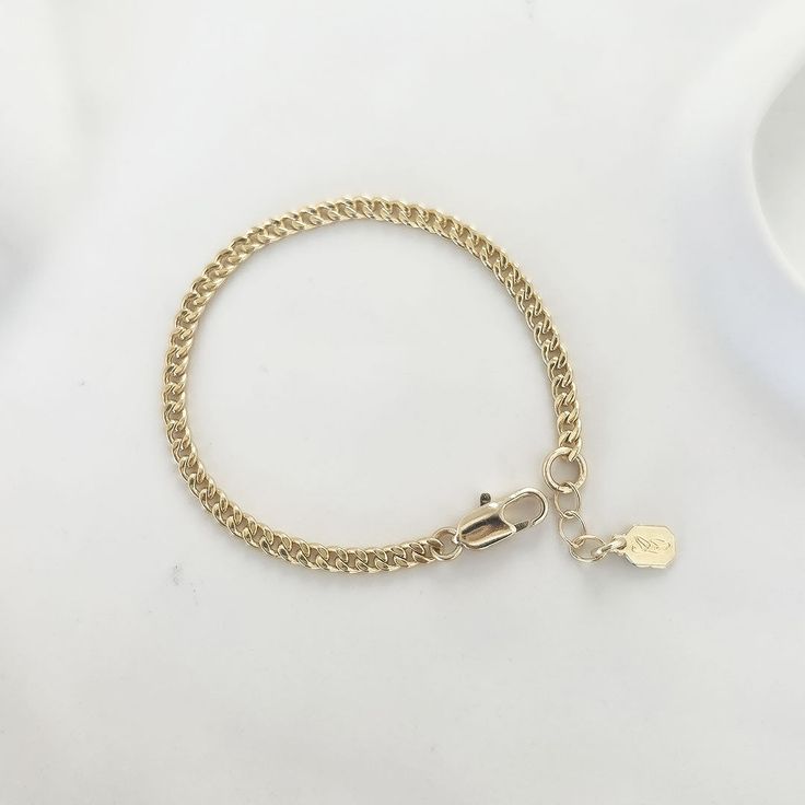 The Shay Bracelet is a subtle statement piece that looks amazing on its own but will also compliment every other piece that you combine with it.Materials:14K Gold Plated Brass Silver Plated Brass Hypoallergenic and Nickel FreeDimensions:Length: 17cm / 6.7"This item comes with a one-year warranty.Greeting card and/or gift receipt for exchange is available with purchase at checkout. Everyday 14k Gold Bracelet With Spring Ring Clasp, Classic Everyday Bracelets With Spring Ring Clasp, Everyday Yellow Gold Bangle Charm Bracelet, Everyday Yellow Gold Charm Bracelet With Extender, Classic Adjustable 14k Gold Chain Bracelet, Minimalist Formal Bracelet With Extender, Dainty Gold Sterling Silver Bracelet For Everyday, Minimalist Bracelet With Extender For Formal Occasions, Minimalist Bracelet With Extender For Formal Events