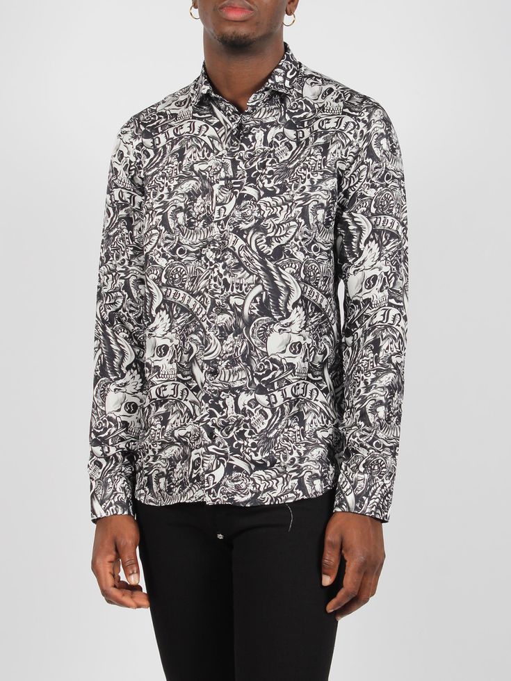 Philipp Plein shirt, in silk twill with all-over Tattoo print. - FW24 - Slim fit - Pointed collar - Button closure - Cuffs with button - Made in Italy - 100% Silk Designer Silk Printed Shirt, Silk Collared Shirt With Graphic Print, Designer Long Sleeve Top With Abstract Print, Designer Silk Collared Shirt, Designer Silk Shirt With Spread Collar, Luxury Spring Graphic Print Shirt, Designer Tops With Printed Spread Collar, Designer Printed Tops With Spread Collar, Designer Collared Shirt With Graphic Print