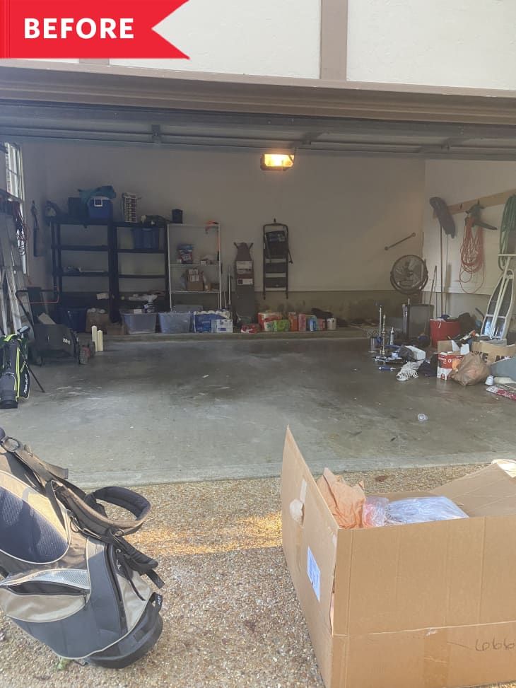 an open garage door with boxes and other items in it