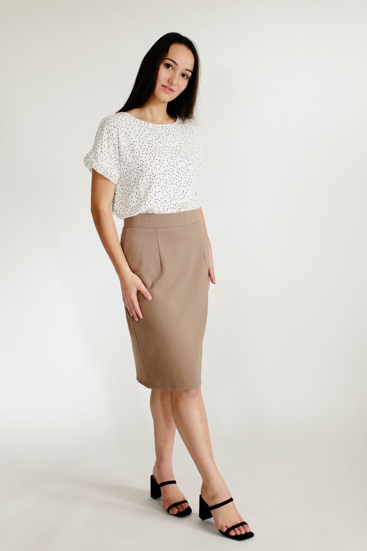 With clean, simple lines and sophisticated style, the 'Anna' is the perfect pencil skirt your closet has been waiting for. Quality fabric, full lining and structured style ensure a modest and flattering fit while an elastic waistband keeps you comfortable. Exclusively designed with you in mind! 68% Rayon 27% Nylon 5% Spandex Hand Wash Cold Separately or With Like Colors Do Not Bleach Hang to Dry Low Iron if Needed 1.75" Waistband Fully Lined ﻿Color may be slightly darker than shown Model Height Spring Casual Pencil Skirt For Office Wear, Business Casual Knee-length Pencil Skirt, Summer Office Wear Fitted Pencil Skirt, Fitted Pencil Skirt For Summer Office Wear, Flattering Relaxed Skirt For Work, Spring Office Wear Midi Pencil Skirt, Casual Lined Pencil Skirt For Business Casual, Elegant Short Brown Skirt, Knee-length Lined Pencil Skirt For Work