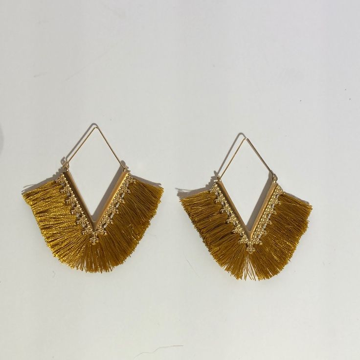 These Earrings Are Brand New And Have Never Been Worn. They Are Golden Color. Message Me With Questions! Gold Tassel Earrings For Party, Yellow Fringe Jewelry For Party, Gold Bohemian Earrings With Fringe, Bohemian Gold Fringe Earrings, Yellow Latkans Earrings For Party, Yellow Party Earrings With Latkans, Yellow Latkan Earrings For Party, Handmade Gold Tassel Earrings For Party, Gold Handmade Tassel Earrings For Party