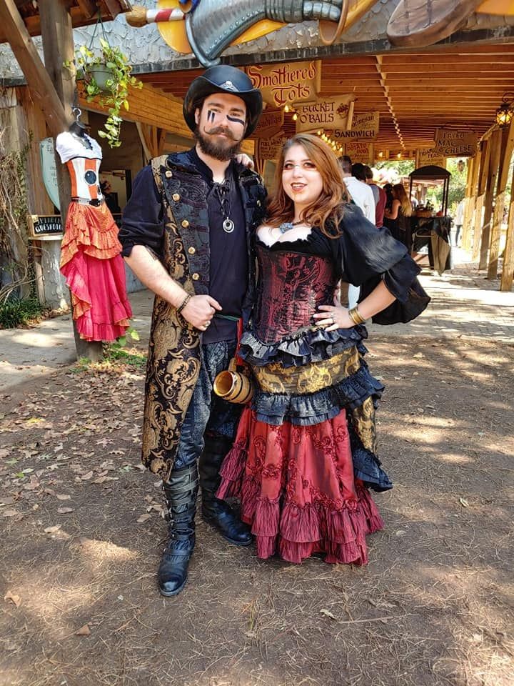 a man and woman dressed up as pirates