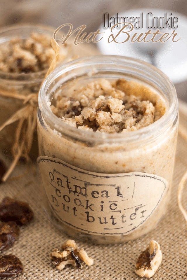 two jars filled with food sitting on top of a table