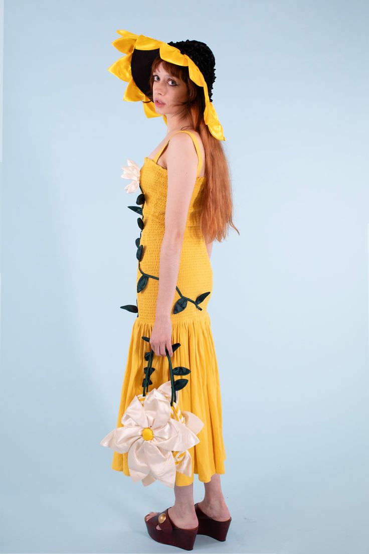 Channel your flower fairy dreams with a hat that is a giant sunflower, perfect for this time of year and every day after, made of 100% cotton canvas base and silk details. Fair trade made in India using our classic best selling hat as the base with silk petals and a fluffy silk ruffle around the top. O/S - 24 1/4 in. Sunflower Race Hat, Sunflower Costume, Head Peice, Flower Bucket Hat, Sunflower Hat, Sunflower Head, Giant Sunflower, Samantha Pleet, Flower Costume