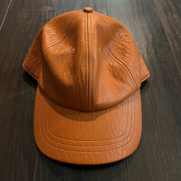 A New Day Pleather Camel Colored Ballcap With Stretchy Back Instead Of Snap Or Threaded. Nwt Brown Leather Curved Brim Baseball Cap, Trendy Leather Hat For Fall, Trendy Brown Baseball Cap With Curved Brim, Brown Adjustable Baseball Cap For Spring, Adjustable Brown Baseball Cap For Spring, Trendy Leather Hats With Curved Brim, Trendy Brown Visor Baseball Cap, Trendy Adjustable Leather Hat, Casual Brown Baseball Cap For Fall