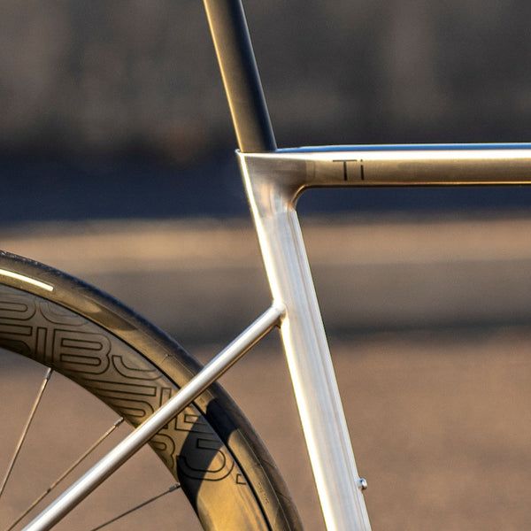 a close up of a bike tire and spokes on the front end of a bicycle