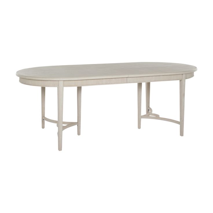 a white table with an oval shaped top and curved legs, against a white background