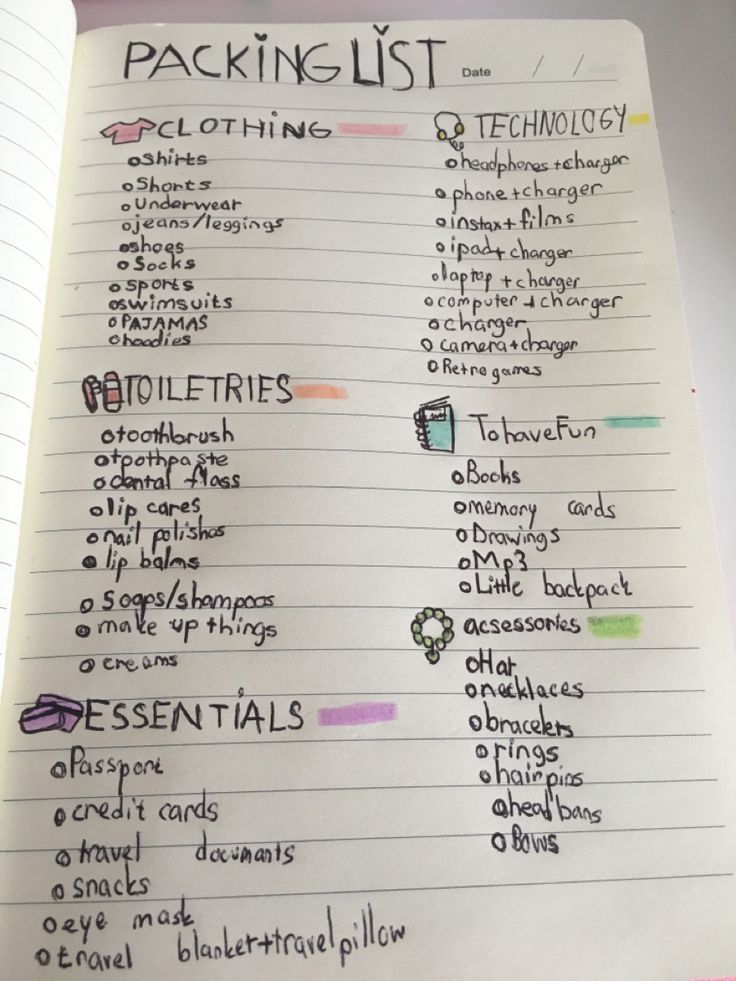 an open notebook with writing on it and the words packing list written in different languages