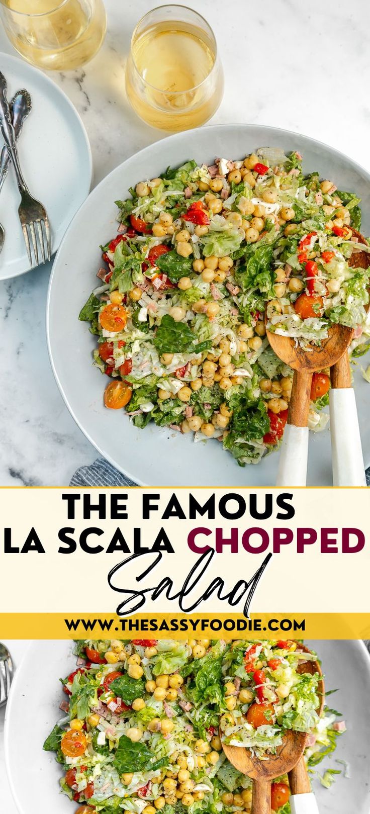 the famous la scalaa chopped salad is served on two white plates with wooden serving utensils