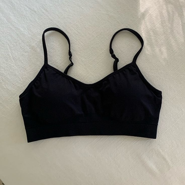 Athleta Black Sports Black. Adjustable Straps. Removable Padding. Size Medium. Brand New/Never Worn. Love This Bra So Much I Realized I Already Had This Bra. Inside Rip Tag Still Attached. Casual Gym Sports Bra With Built-in Bra, Comfortable Sports Bra With Medium Support, Black Sports Bra With Seamless Construction For Workout, Comfortable Medium Support Sports Bra, Comfortable Medium Support Sports Bra For Sports, Black Sports Bra For Light Exercise, Black Seamless Sports Bra For Workout, Casual Compression Seamless Sports Bra, Seamless Sports Bra For Workout Season