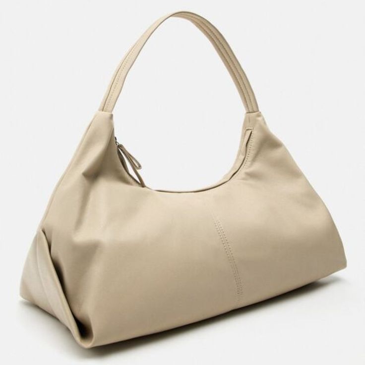 Large Soft Shoulder Bag. Shoulder Strap. Zip Closure. Height X Length X Width: 13 X 18.9 X 7.5 Inches (33 X 48 X 19 Cm) Ecru | 6096/110 Trendy Large Capacity Zara Shoulder Bag, Trendy Zara Shoulder Bag With Large Capacity, Zara Casual Bags For Errands, Casual Zara Bags For Everyday Use, Elegant Zara Satchel For Travel, Casual Zara Shoulder Bag For Shopping, Zara Casual Everyday Bags, Casual Everyday Zara Bags, Versatile Everyday Bags From Zara