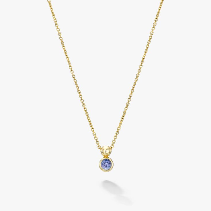 Whether celebrating a special birthday, meaningful sentiment or moment in time, gemstones have connected humanity for millennia. Our modern single-stone necklace, available in 12 juicy natural gems, is a beautiful way to wear or gift a meaningful piece that speaks to your unique connection. Our unique orb bail allows the chain to easily slide, so your pendant moves with you. The secure bezel setting creates a minimal look perfect for everyday wear, while the solid 14k diamond-cut chain gives a h Formal Birthstone Pendant Necklace, Modern Necklace With Round Cut For Gift, Modern Round Cut Necklace For Gift, Sapphire Round Pendant Birthstone Necklace, Dainty Gemstone Birthstone Necklace For Formal Occasions, Formal Dainty Birthstone Necklace With Gemstones, Dainty Formal Birthstone Necklace With Gemstone, Elegant Oval Pendant Birthstone Necklace, Sapphire Fine Jewelry Birthstone Necklace