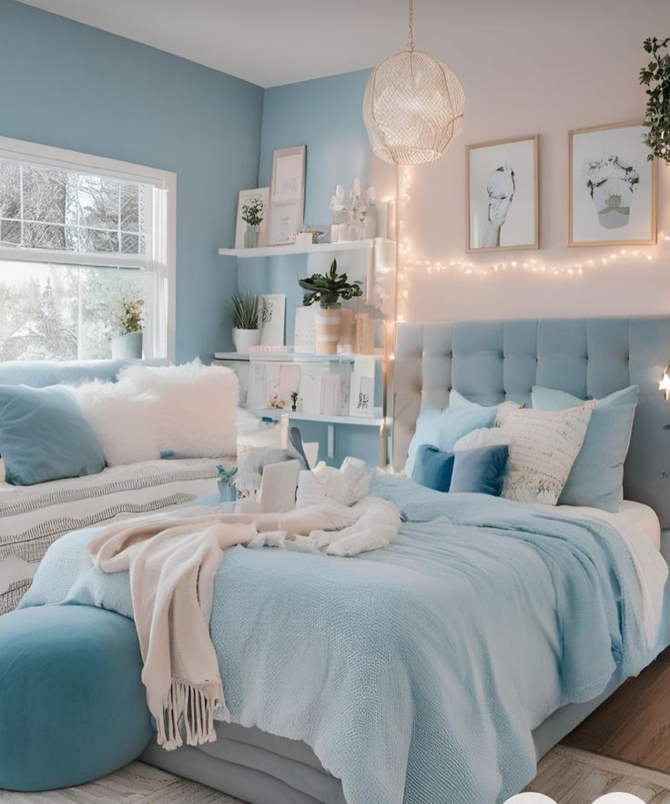 a bed room with a neatly made bed and blue walls