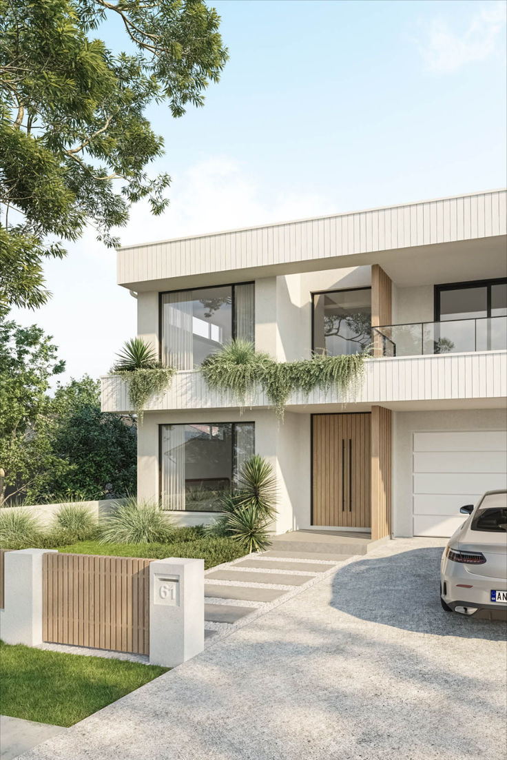 an artist's rendering of a modern house with two cars parked in the driveway