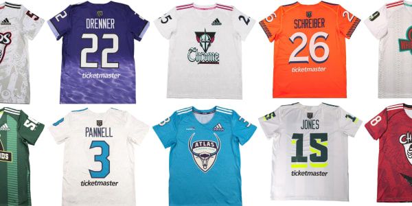 many different colored jerseys are shown in this image, including one with the number 22 on it