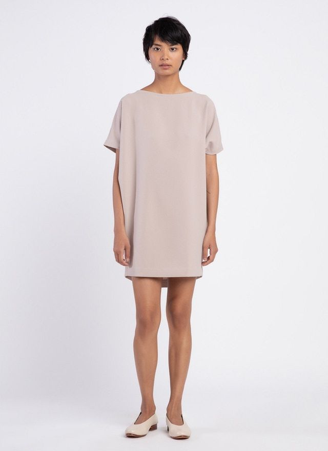 KAAREM - Angle Mini Dolman Open Back Dress - Cream Elegant Daywear Tunic, Spring Evening Dress With Batwing Sleeves, Chic Daywear Dress With Pleated Back, Chic Short Sleeve Dress With Button Back, Chic Short Sleeve Button Back Dress, Cream Mini Dress With Short Sleeves, Chic Evening Dress With Button Back, Chic Evening Dresses With Button Back, Neutral Short Sleeve Dress For Work