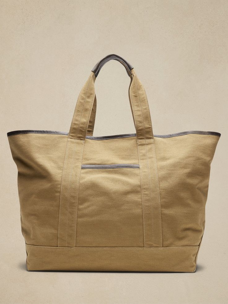 Large Canvas Tote | Banana Republic Khaki Canvas Bag For Travel, Everyday Canvas Lined Tote Travel Bag, Double Handle Canvas Bag, Khaki Rectangular Canvas Travel Bag, Canvas Weekender Bag With Pockets, Classic Tote Bag With Pockets, Classic Canvas Shoulder Bag With Canvas Lining, Everyday Canvas Tote Travel Bag, Canvas Weekender Bag With Pockets For Weekend Trips