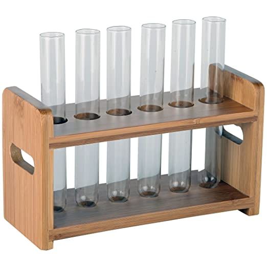 a wooden rack with six glass tubes on it and four empty glasses in the bottom