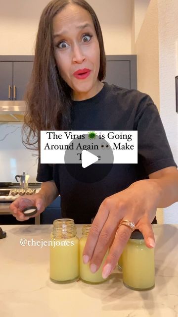 a woman holding two jars in front of her face with the caption, the virtus is going around agains to make 1 - 2