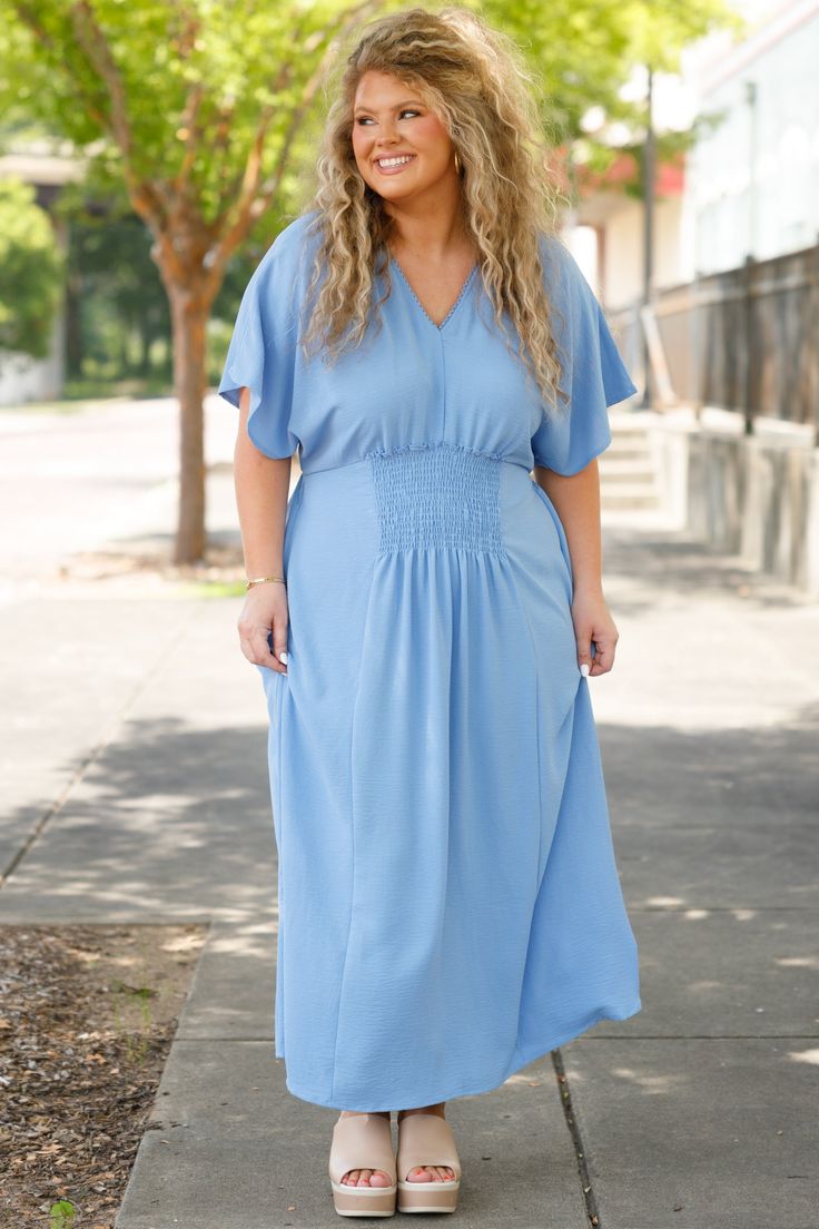 This dress is the perfect way to stay comfortable and stylish throughout the season! Expertly crafted with a flowy fit, this dress is perfect for any occasion and its perfect maxi length offers a breezy look! Its beautiful blue color makes it perfect for brunch with the girls! 100% Polyester Modest V-neck Maxi Dress For Day Out, Light Blue Maxi Dress For Brunch, Casual Light Blue Maxi Dress, Spring Vacation Light Blue Maxi Dress, Light Blue Maxi Dress For Spring Vacation, Blue Backless Maxi Dress For Spring, Chic Flowy Light Blue Maxi Dress, Modest Flowy Maxi Dress For Brunch, Modest Flowy Maxi Dress