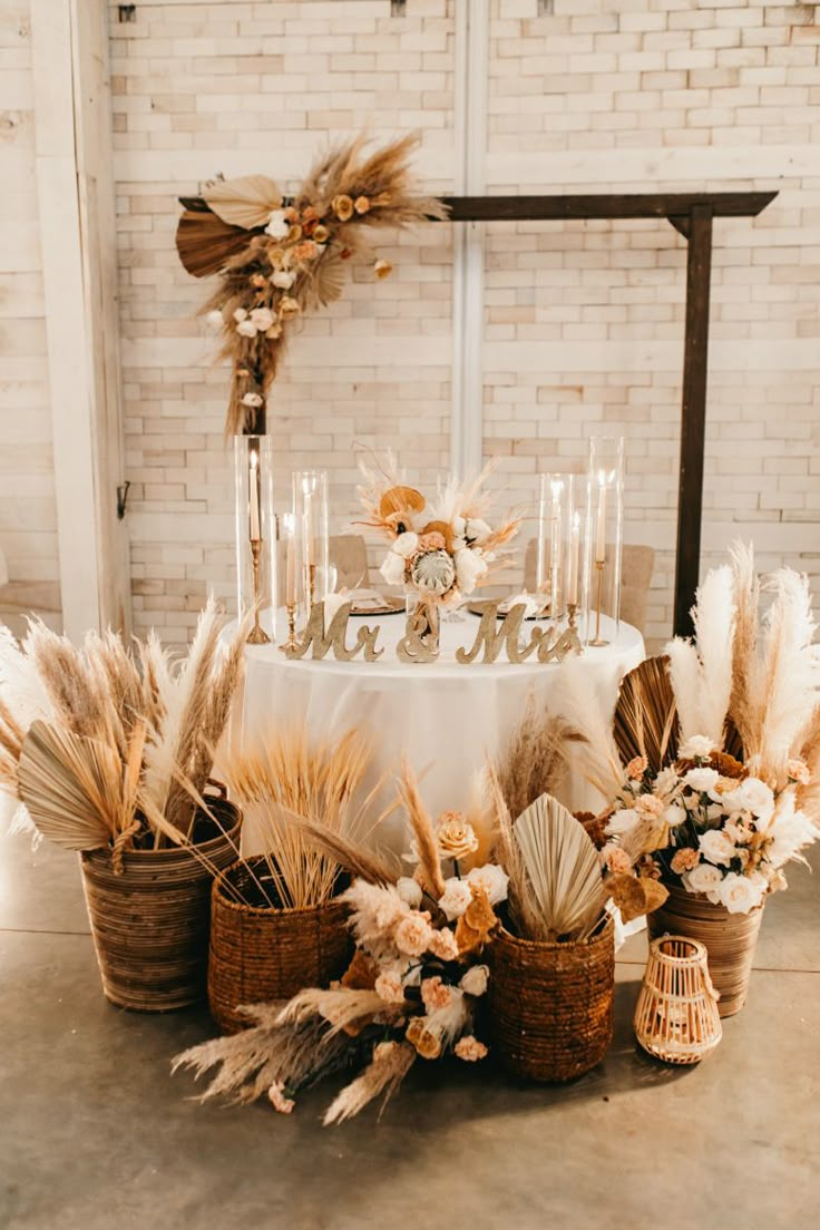 Boho wedding, boho sweetheart table, pampas grass, boho flowers, boho wedding decor Wedding Centerpieces Bride And Groom Table, Boho Bridal Party Table, Boho Wedding Blush Pink, Cake Table Boho Wedding, Bride And Groom Table Pampas, Pampas Grass Table Setting, Boho Bridal Table Decor, Boho Industrial Wedding Decor, Boho Wedding Tablescape Round