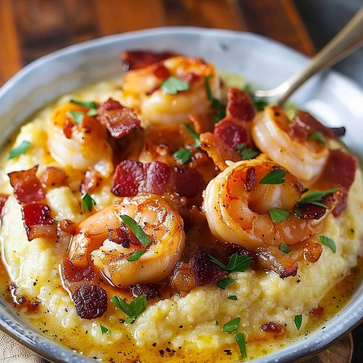 shrimp and grits with bacon in a bowl