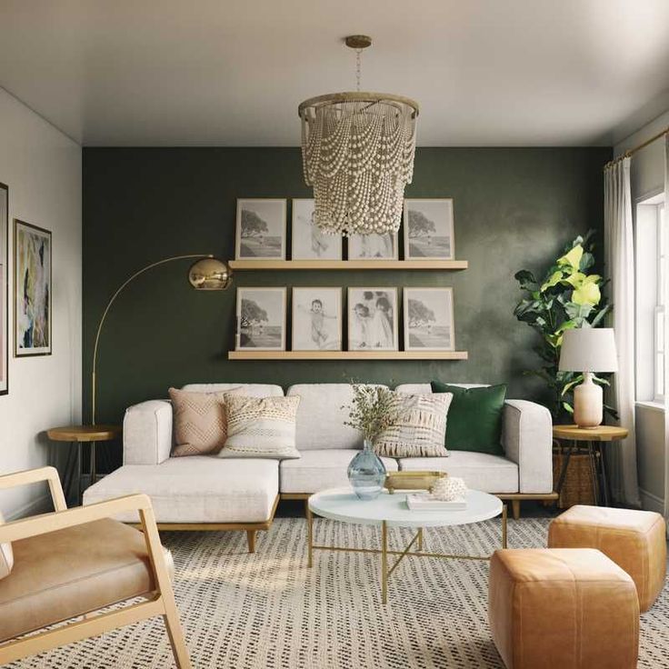 a living room filled with lots of furniture next to a wall covered in framed pictures